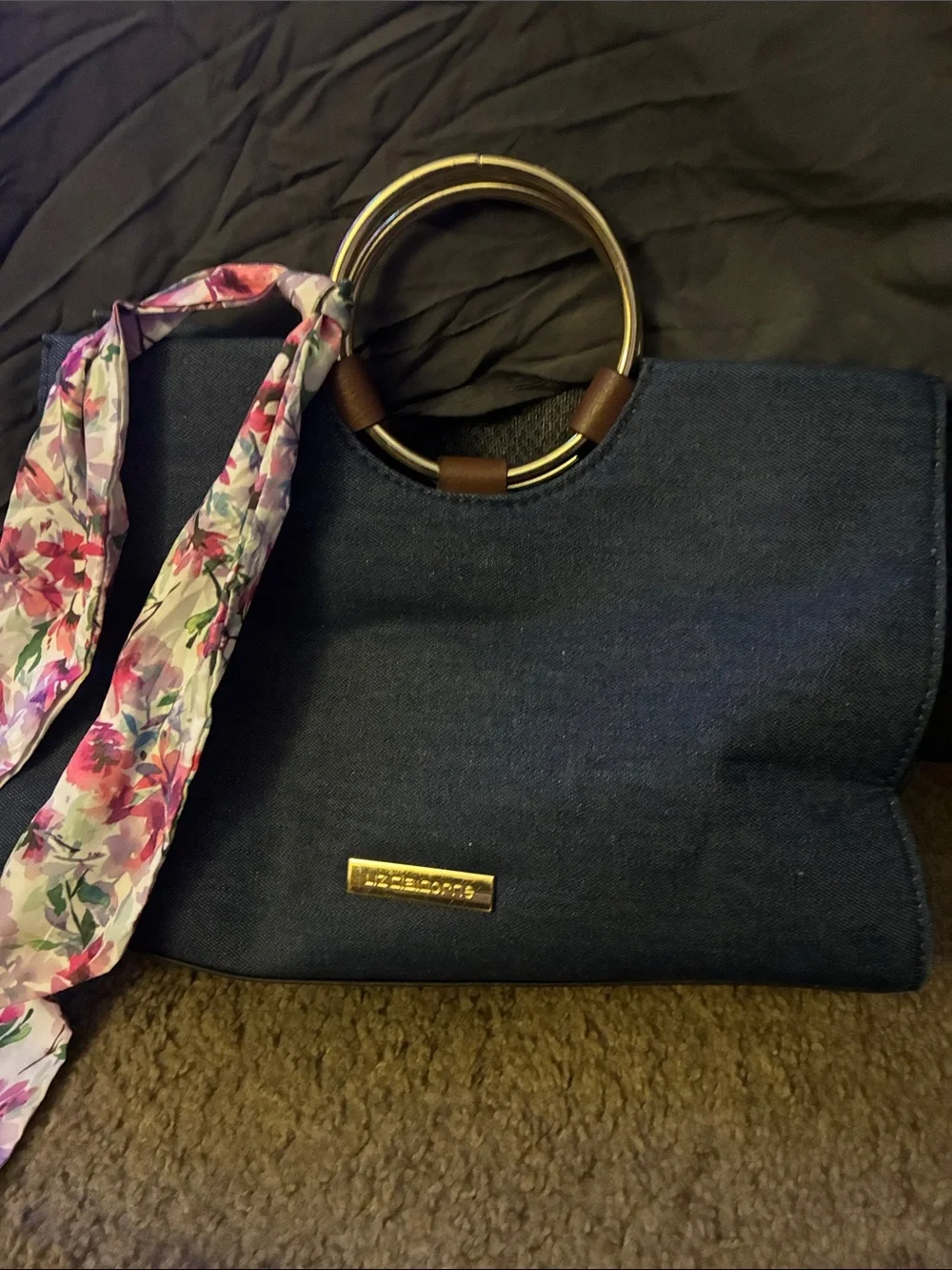 Stylish Navy Blue Handbag with Gold Ring Handles